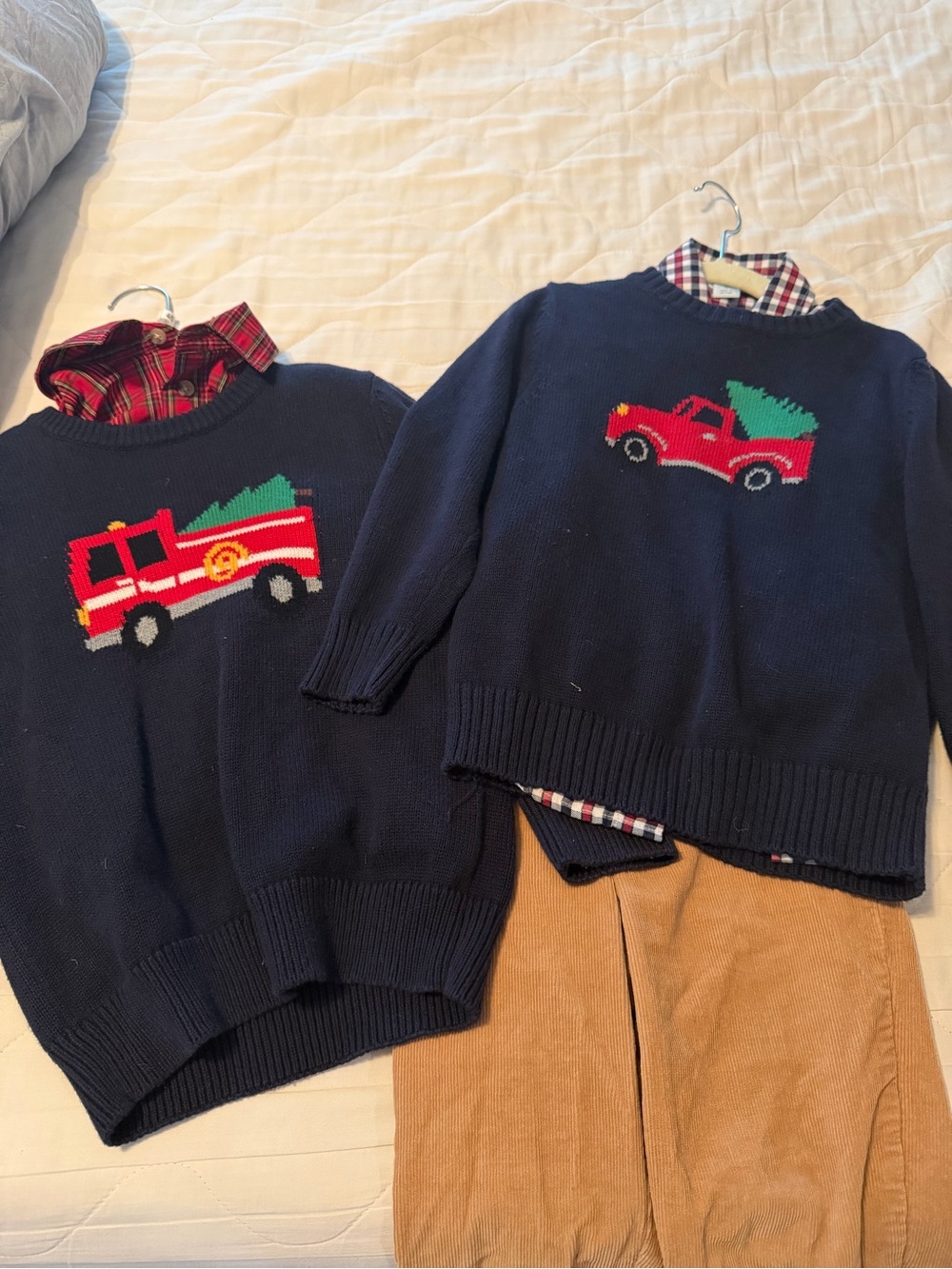 Two shirts, two sweater and a pair of cords